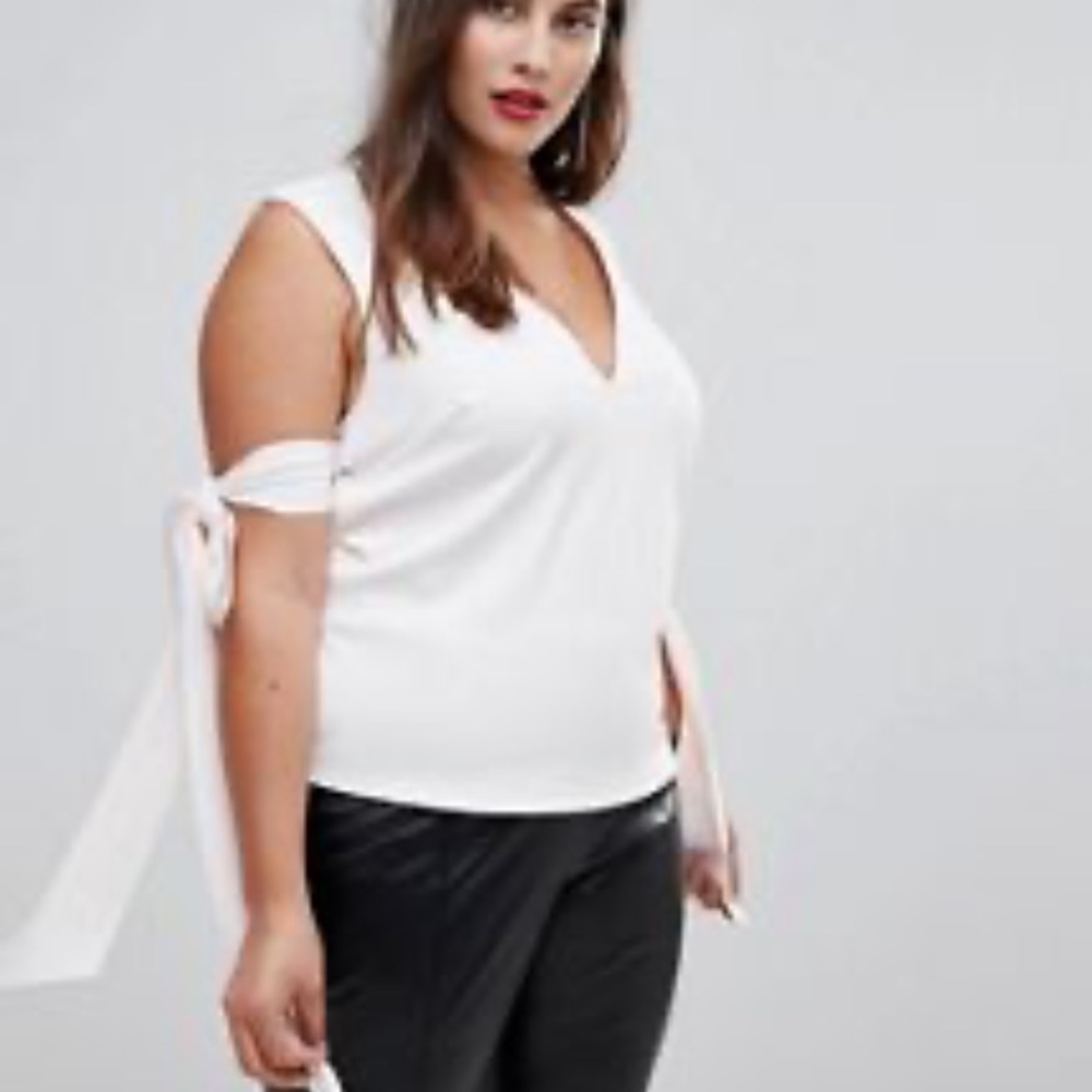 Sleeveless blouse with arm ties